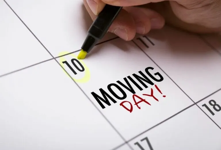 Monthyly calendar with "Moving Day" written on the tenth day.