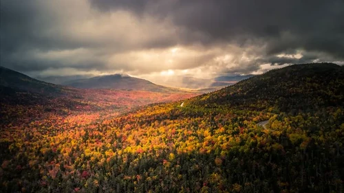 Scenic view of a mountain range in New Hampshire as Summer turns to Fall.